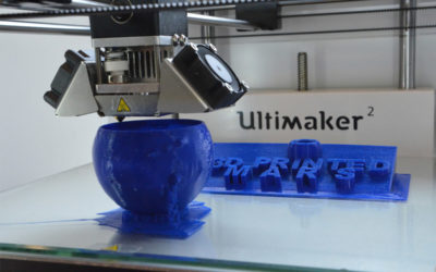 3D Printer making a blue bowl